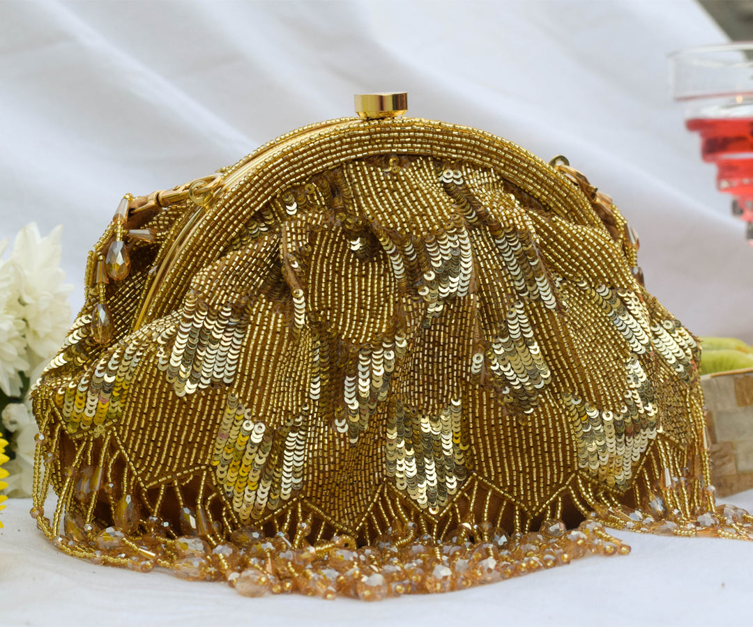 Hrutvy Clutch – Gold